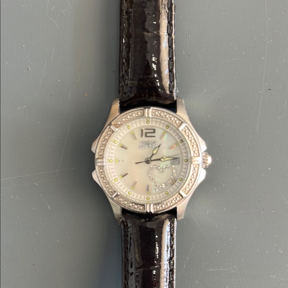 Invicta Black and Silver Watch with Classic Design
